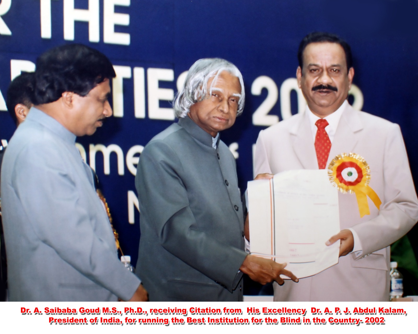 Dr. Saibaba Goud receiving citation from Dr. A.P.J. Abdul Kalam